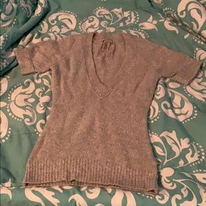 Short sleeve sweater shirt.